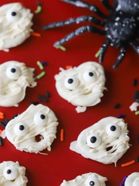 Little mummy pretzels decorated with candy eyes