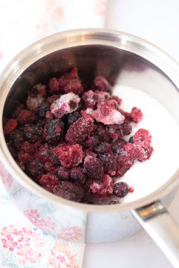 berry syrup ingredients in a saucepan, how to make berry syrup.