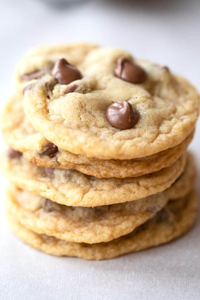 best chocolate chip cookie recipe on a baking sheet, chewy chocolate chip cookies, chocolate chip cookies with salted butter.