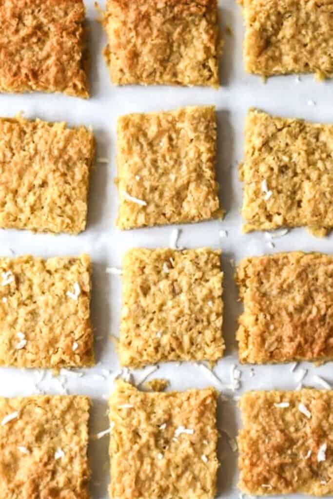 how to make Coconut cookie bars from scratch using rolled oats and shredded coconut.