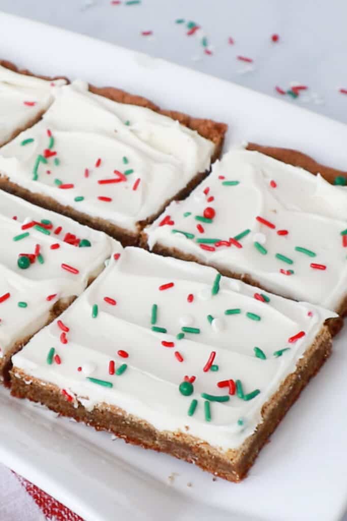 gingerbread cookie bars with Christmas sprinkles, can be made as gingerbread squares or a gingerbread bar recipe.