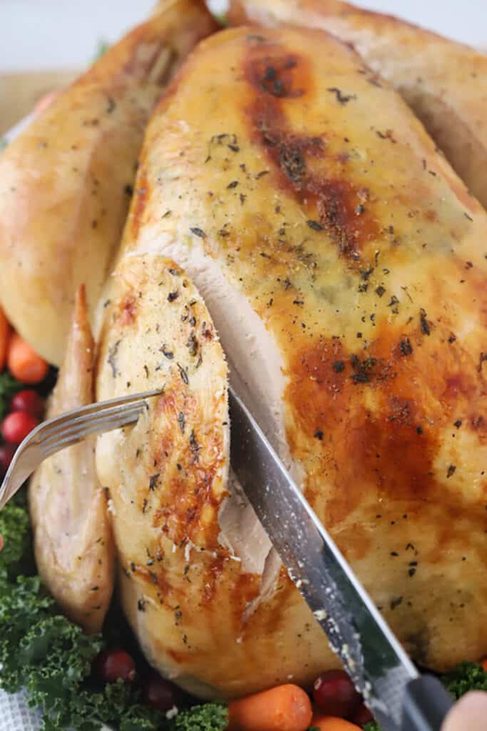 how to stuff a whole turkey, making turkey moist, tender and delicious. Herb roasted turkey recipe. 