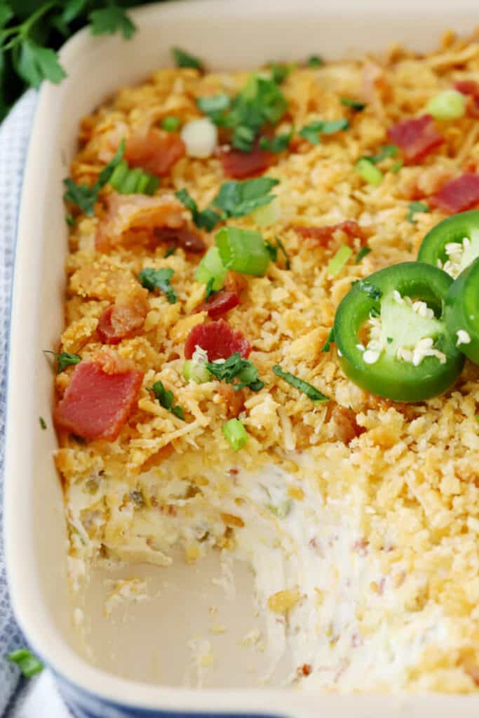 jalapeno popper dip with bacon recipe in a baking dish