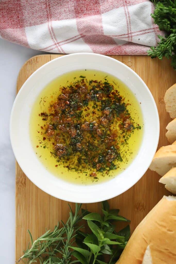 best olive oil dip for bread, bread dipping oil, olive oil bread, oil bread dip.