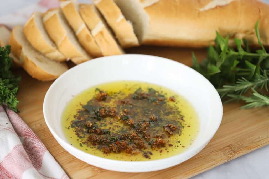 olive oil dip for bread, best bread dipping oil, roasted garlic bread dipping oil.