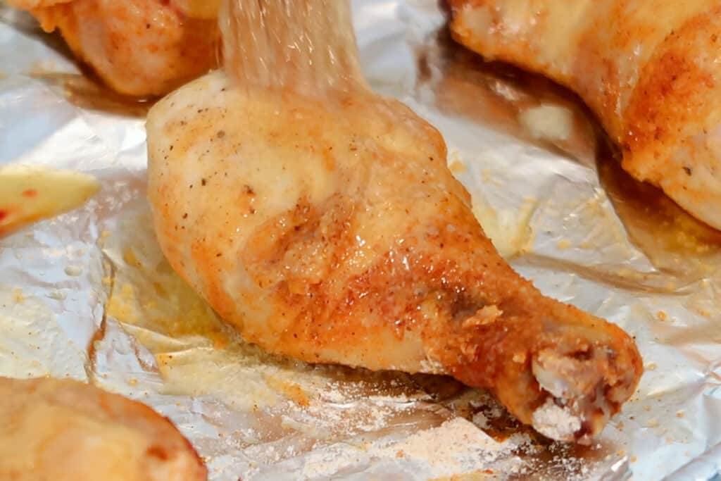 oven baked chicken drumstick on a baking sheet, chicken leg recipes easy. how to make chicken drumsticks, how to cook drumsticks in the oven