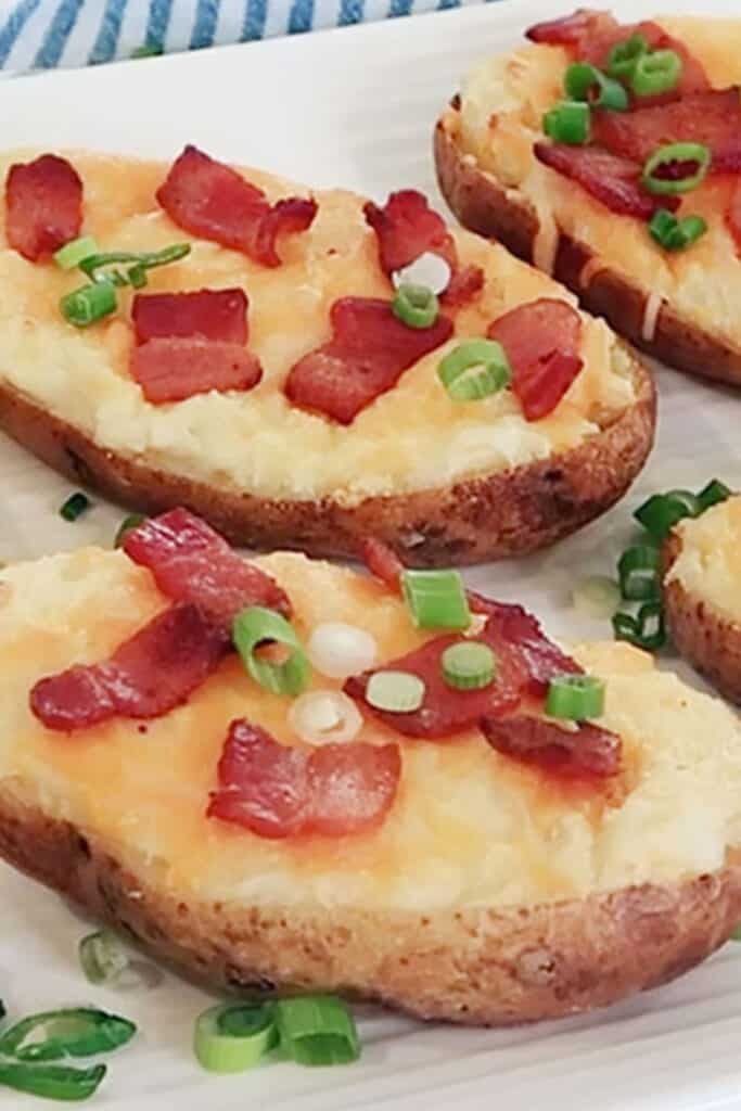 how to make the best twice baked potatoes recipe with 3 cheeses and bacon. These are the best cheese baked potatoes.