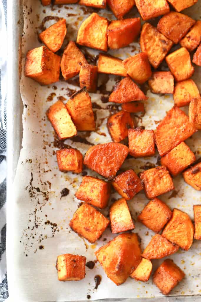 how to make sweet chili spiced oven roasted sweet potatoes recipe. sweet potato side dish. 