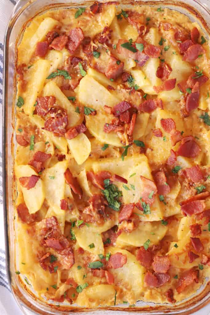 easy scallop potatoes with bacon in a baking dish.