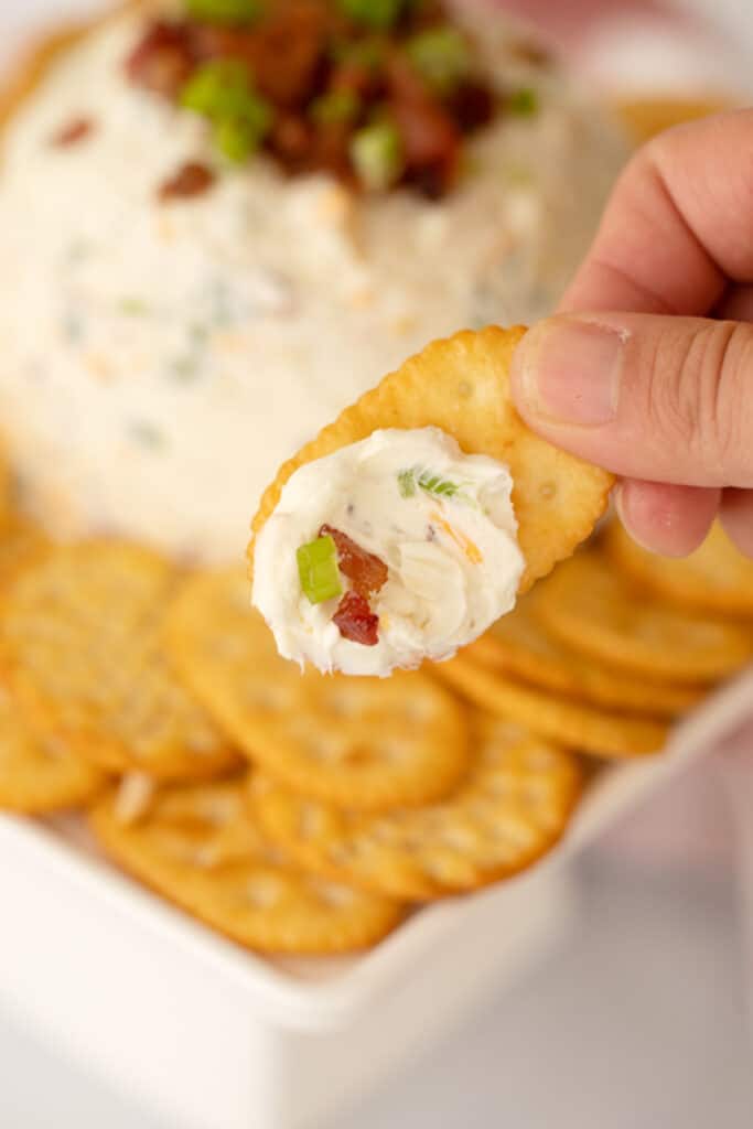 hidden valley ranch cheese ball on a cracker, easy holiday appetizers.