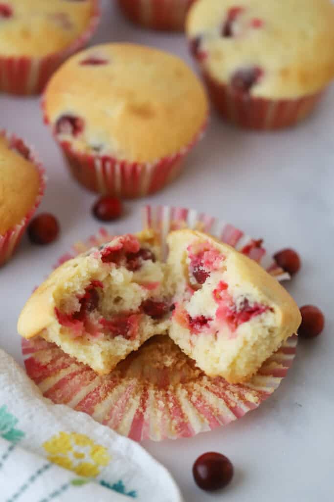 Buttery and moist fresh cranberry muffins with orange flavor. These are the best orange cranberry muffins.