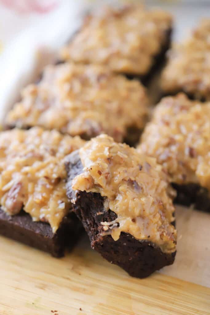 German Brownies with German Chocolate cake topping made with coconut and pecans. It's like a caramel German chocolate frosting.