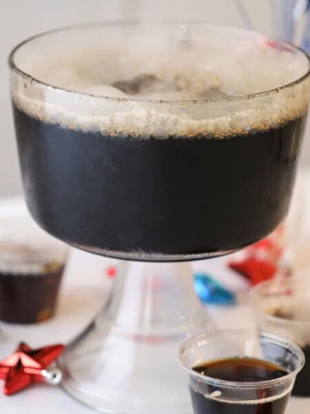 A punch bowl full of homemade root beer for an easy halloween menu idea