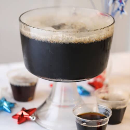 A punch bowl full of homemade root beer for an easy halloween menu idea