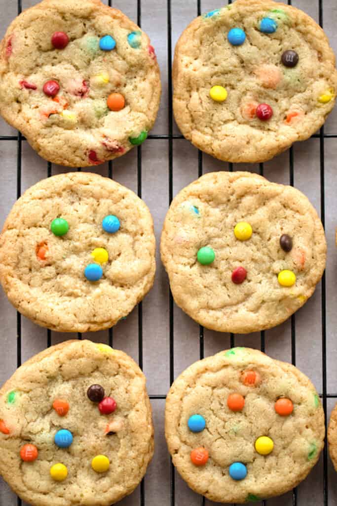 chocolate m&m cookies on a cooking rack, could use this to make mini m&m cookies recipe too.