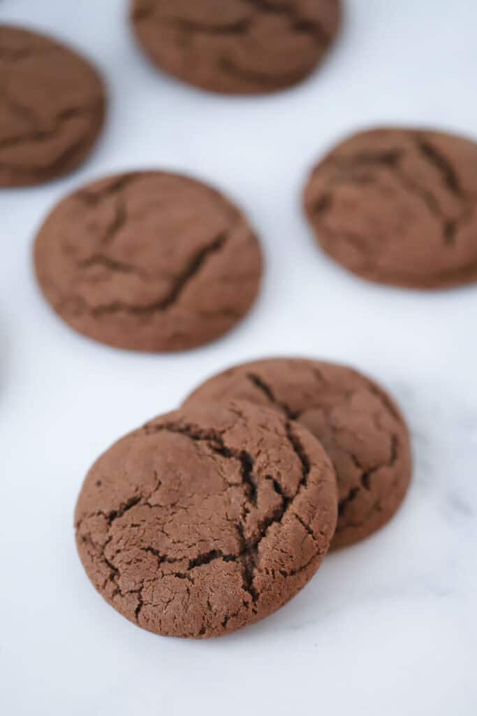 Chewy Chocolate Cookies on a counter top, the best plain chocolate cookie recipe.