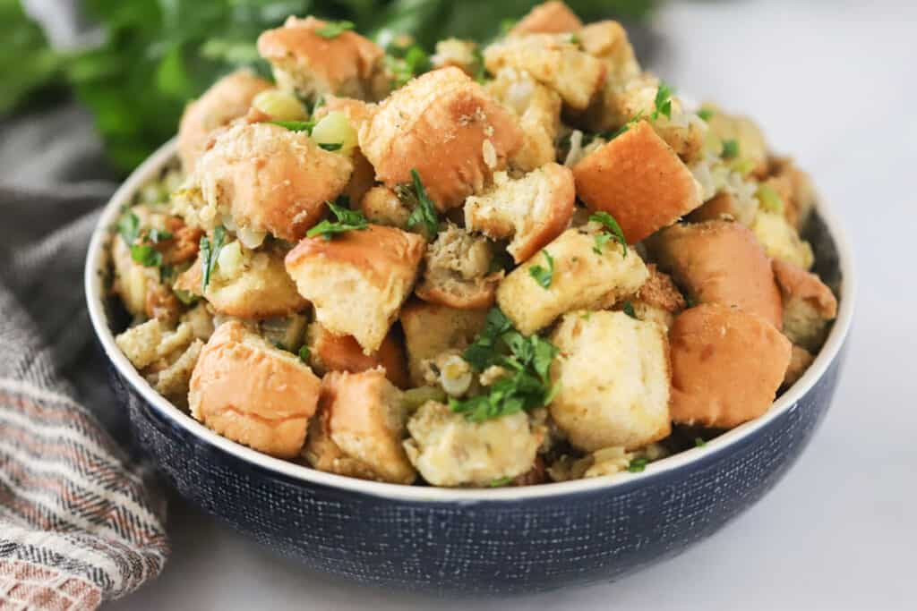 A bowl full of crock pot Thanksgiving stuffing.