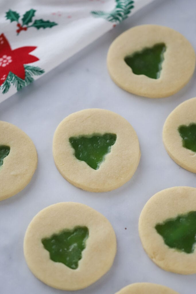 Stained Glass Cookies cut with christmas tree cookie cutters, easy christmas cookies.