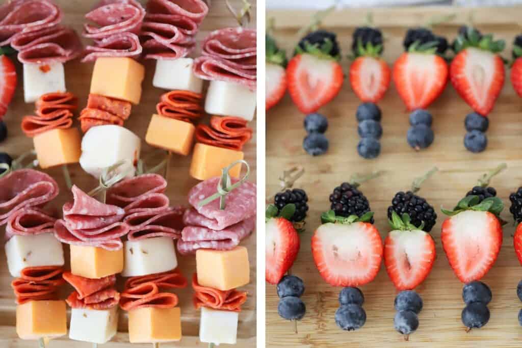 Skewers of sliced salami, pepperoni, and cheese for individual cup appetizers on one side and Bamboo toothpicks with fresh berries on a cutting board. Individual charcuterie cups ideas.