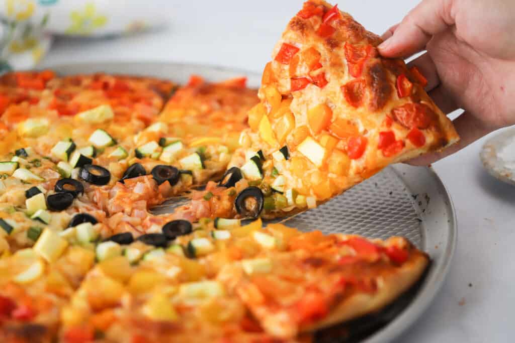 The best veggie pizza recipe with a rainbow of colored vegetables.