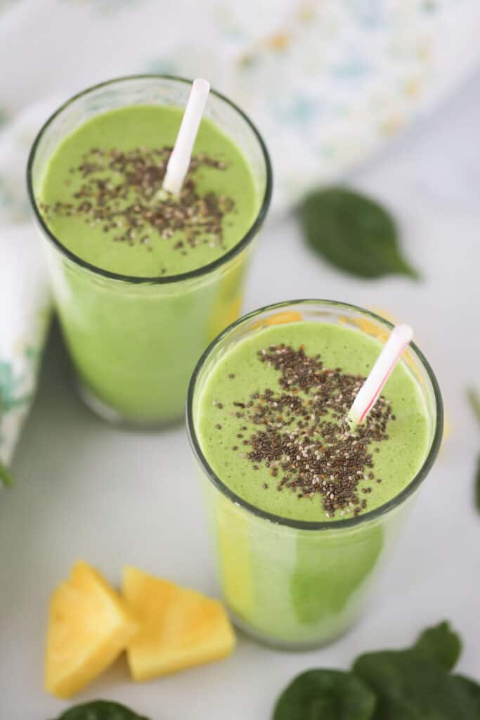 Healthy green smoothies topped with chia seeds.