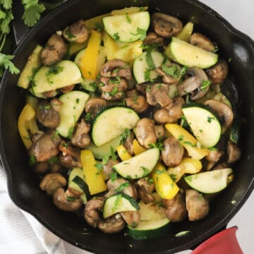 sauteed veggies in a cast iron skillet.
