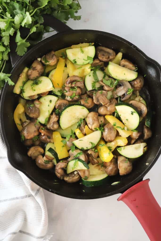 Stir fry veggies in a cast iron skillet; a great pan for sauteing vegetables.