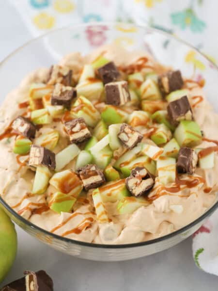 A bowl full of snickers apple salad.