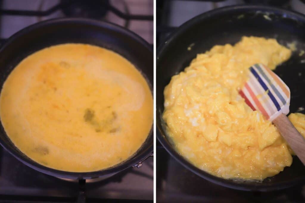 Scrambled eggs cooking in a nonstick skillet with a silicone spatula gently folding.