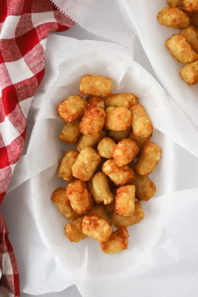 A basket of tater tots.