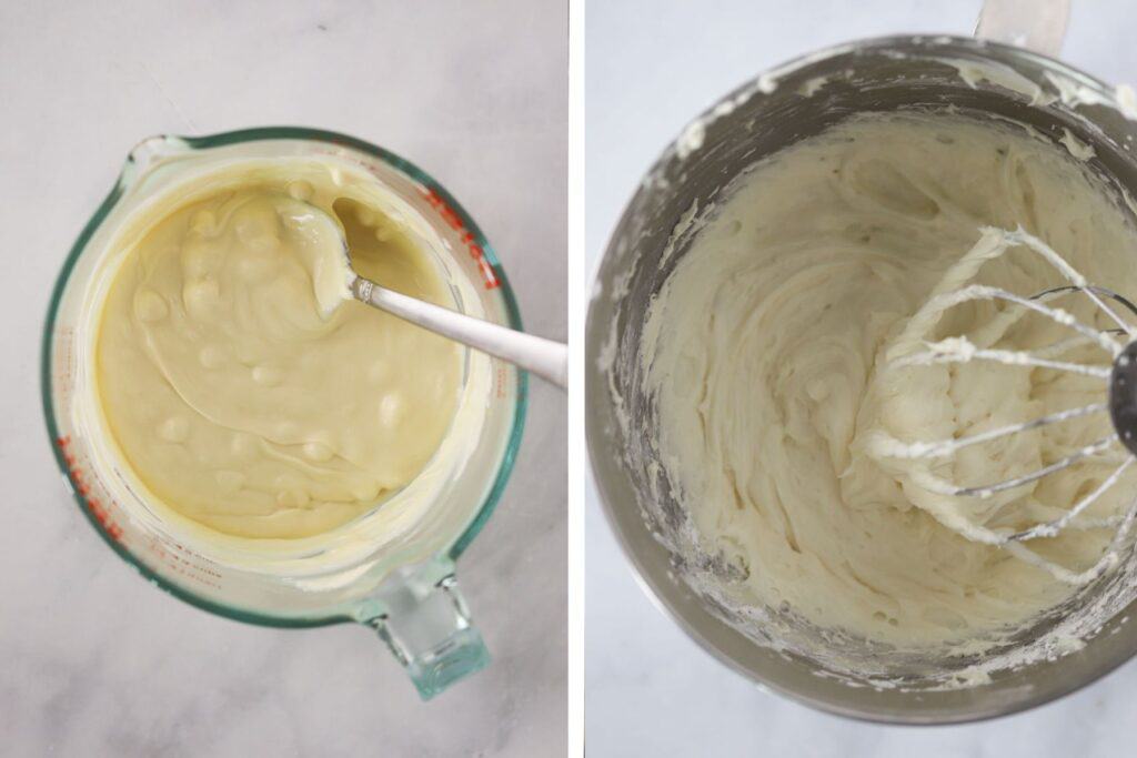 Melted white chocolate in a glass measuring cup with a stand mixer bowl full of cream cheese frosting.
