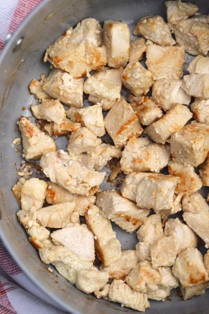 golden brown chunks of chicken to make homemade pasta dinner with tortellini pasta
