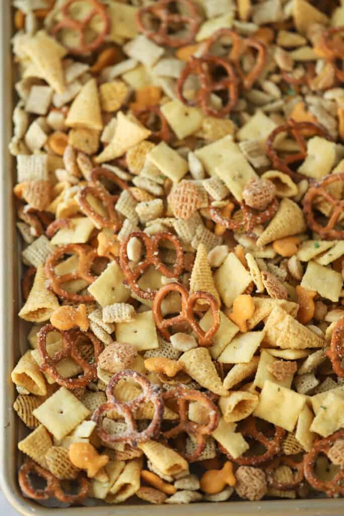 Ranch Chex Mix on a baking sheet ready to bake.