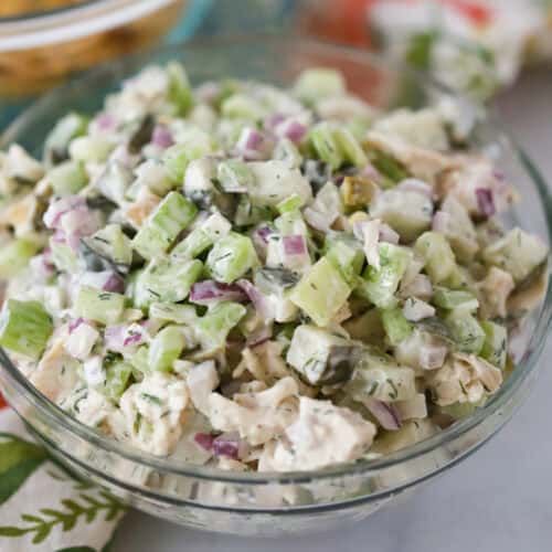dill pickle chicken salad recipe in a glass bowl