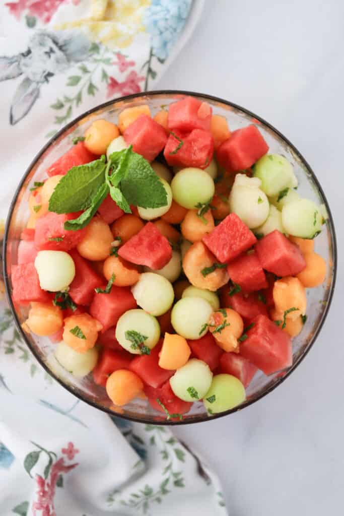 A summer melon salad with watermelon, cantelope, honeydew, and fresh mint.