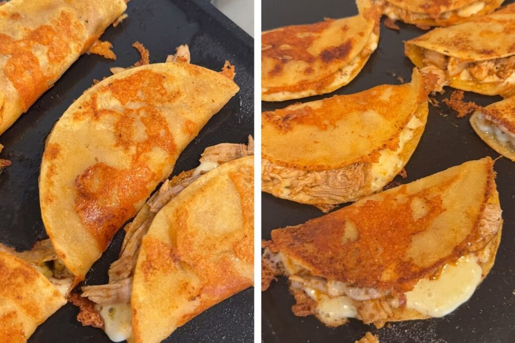A griddle with birria tacos cooking.
