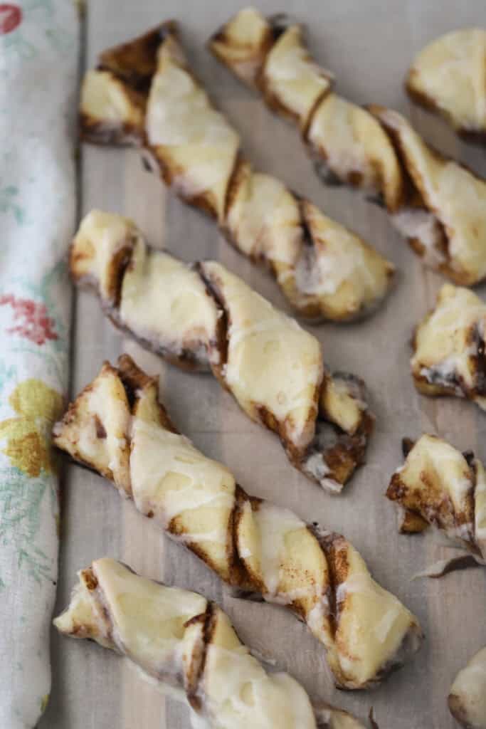 A baking sheet with cinnamon twists on top.