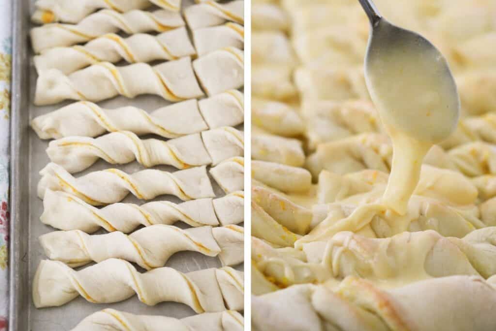 A spoon drizzling orange glaze over the tops. of baked breadsticks.