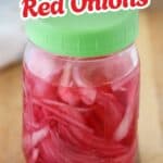 easy homemade Pickled Red Onions in a jar with a green lid