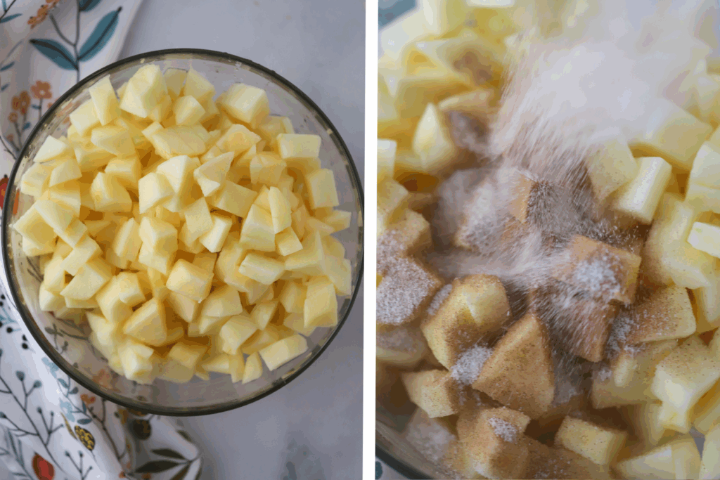 Diced apples in a glass bowl with cinnamon and sugar being added.