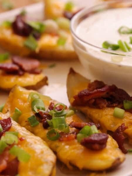 loaded baked potato skins reicipe with cheese and bacon, easy baked potato skins recipe