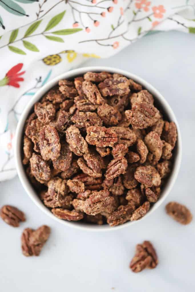 A large bowl full of cinnamon sugar pecans.
