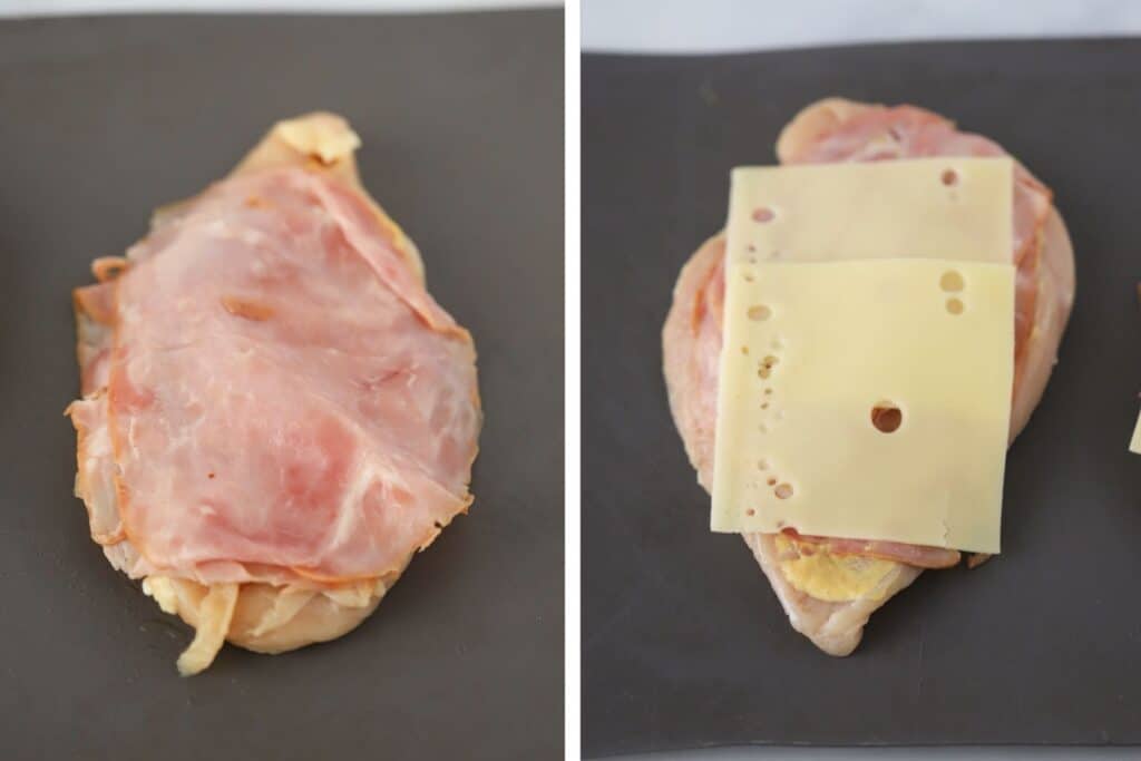 Pounded chicken breasts stuffed with ham and Swiss cheese ready to be rolled up to make chicken cordon bleu.