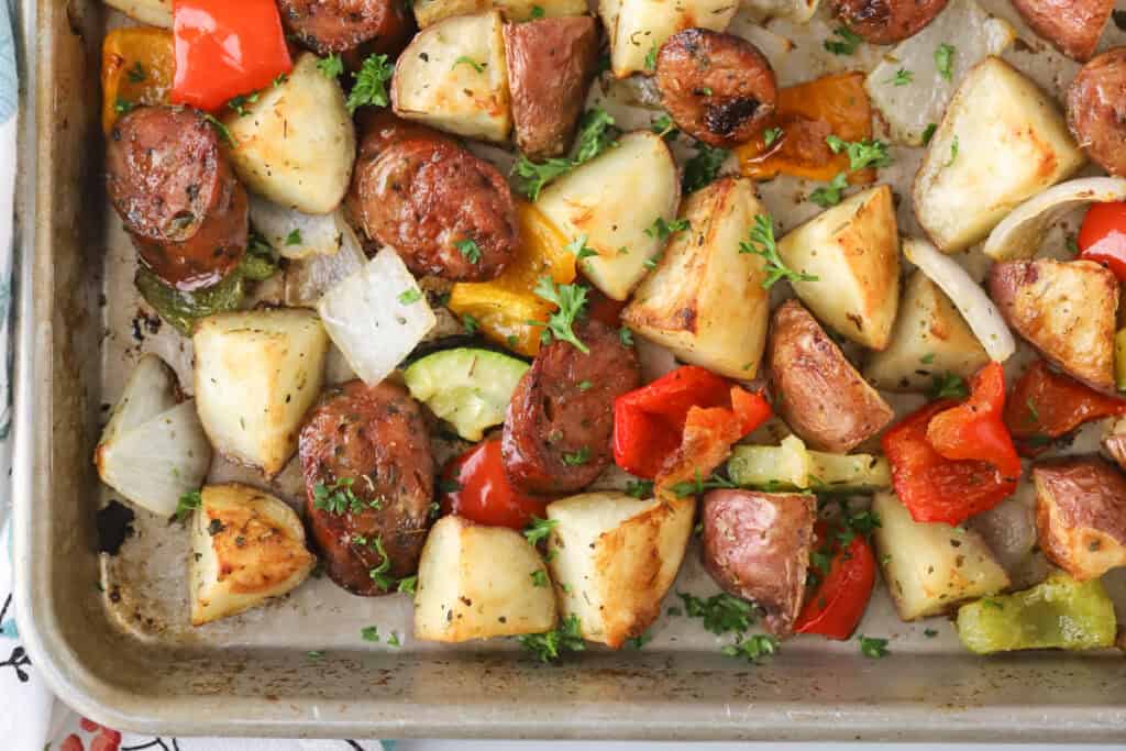 Sausage and veggies roasted in a sheet pan.
